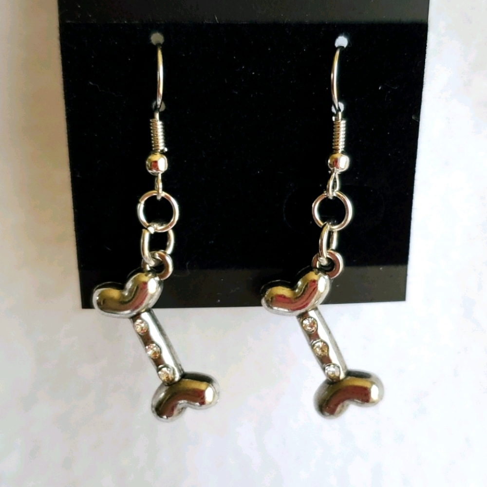 Womens silver dog bone with rhinestones earrings